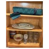 Contents of cupboard, glassware, serving plates,