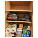 Contents of cupboard, bags, bakeware etc