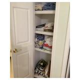 Contents of linen closet-towels, pillows,