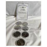 7 Morgan dollars, stamped "COPY", not silver w/COA