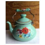 The Pioneer woman tea pot, shows wear