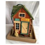 Rustic wooden hanging grist mill bird feeder,