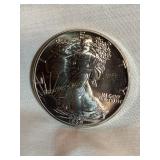 1989  (N/M) silver Eagle dollar coin, 1 oz. fine