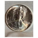 1986 (N/M) silver Eagle dollar coin, 1 oz. fine