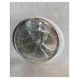 2004 (N/M) silver Eagle dollar coin, 1 oz. fine