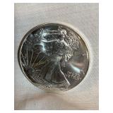 1999 (N/M) silver Eagle dollar coin, 1 oz. fine