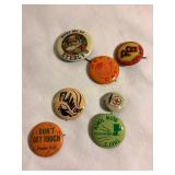 7  vintage buttons, pin back, etc. Eyerlys