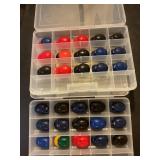 30 miniature baseball helmets in cases
