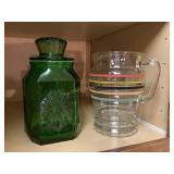 Contents of kitchen shelf- green glass