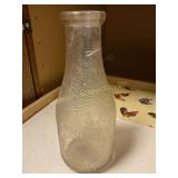 Eldridge Dairy qt milk bottle, textured glass,