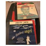 Vintage vinyl 78 record sets, some show wear,