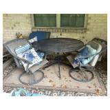 Metal patio table (47"D) w/ 3 swive l chairs &