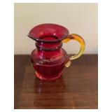 Ruby  red/yellow glass creamer, 3"H
