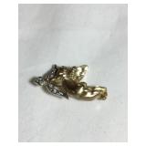 10 kt Cupid pin/brooch, 1"W, .08 oz.