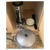 Contents on kitchen cabinet shelf- Maglite,