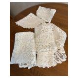 6 Lacey doilies/dresser scarves, longest is 52"