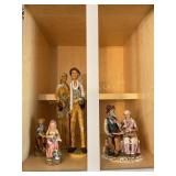 Contents of cabinet- figurines, tallest is 18"