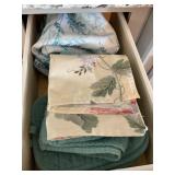 Contents of drawer- kitchen linens, tablecloth,