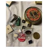 Misc pins, keys, tobacco tin, etc