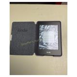 Kindle in purple case  working 3 1/2" x 4 3/4",