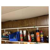 Contents of 1 shelf, caulking, guns, WD-40,