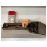 Metal tool carrier w/ sockets, drill bits, knife