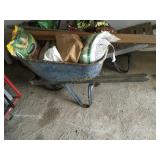 Cement Wheelbarrow w/lawn seed,extra handles,etc.