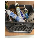 Misc crate of caulking, liquid nails, silicone,