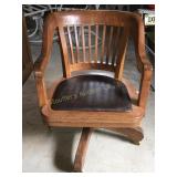 Globe Wernicke Co.  Oak office chair on casters