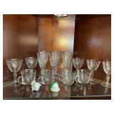 Contents of shelf, glasses cups
