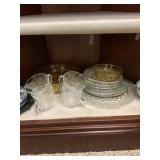 Shelf glasswarecontents, cups, plates, spoon