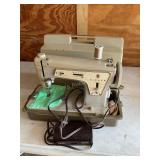 Singer sewing machine w/case, model 237, not