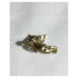 10 kt Cupid pin/brooch, 1'W, .08 oz.