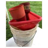 Bucket of funnels