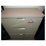 Metal File Cabinet has Formica Top w/key  36" x