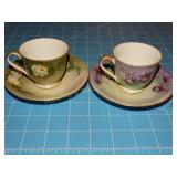 2 hand painted tea cups & saucers