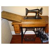 Antique Singer Sewing Machine in Oak Cabinet