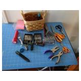 Scissors, Note pads, hole punches, screw drivers,