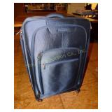Luggage Samsonite on rotating rollers