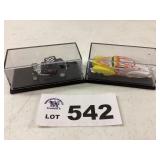 TWO CARS IN COLLECTOR BOXES