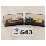 TWO CARS IN COLLECTOR BOXES