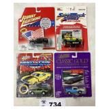ASSORTMENT OF FOUR JOHNNY LIGHTNING