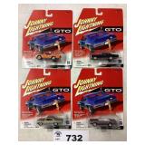 ASSORTMENT OF FOUR JOHNNY LIGHTNING