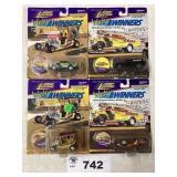 ASSORTMENT OF FOUR JOHNNY LIGHTNING