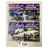 ASSORTMENT OF FOUR JOHNNY LIGHTNING