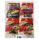 ASSORTMENT OF FOUR JOHNNY LIGHTNING