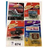 ASSORTMENT OF FOUR JOHNNY LIGHTNING