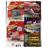 ASSORTMENT OF FOUR JOHNNY LIGHTNING