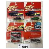 ASSORTMENT OF FOUR JOHNNY LIGHTNING