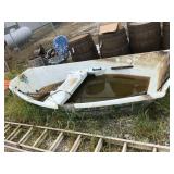 FIBERGLASS BOAT-OUTSIDE DAMAGED BUT HOLDS WATER